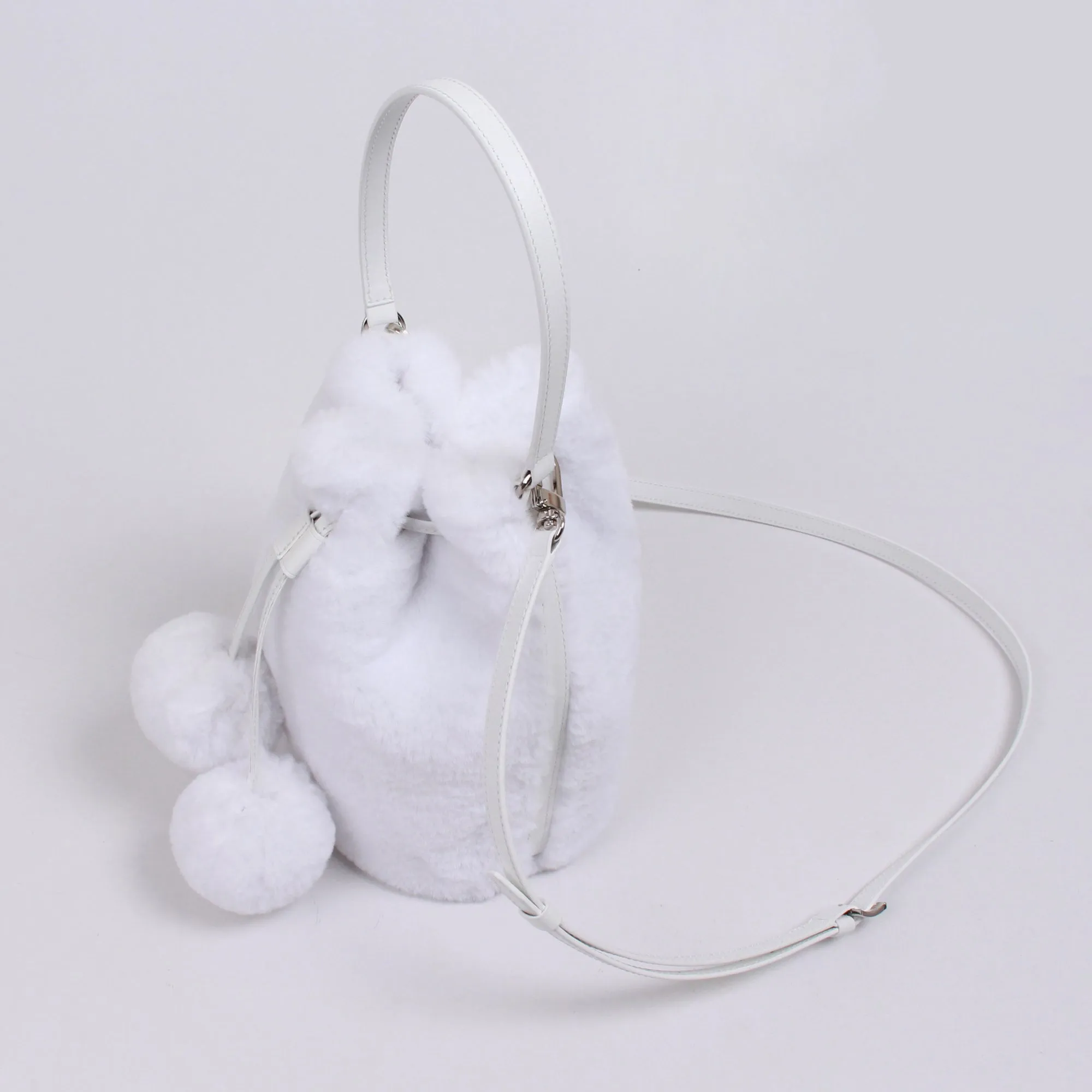 snowball. fur shoulder bag.