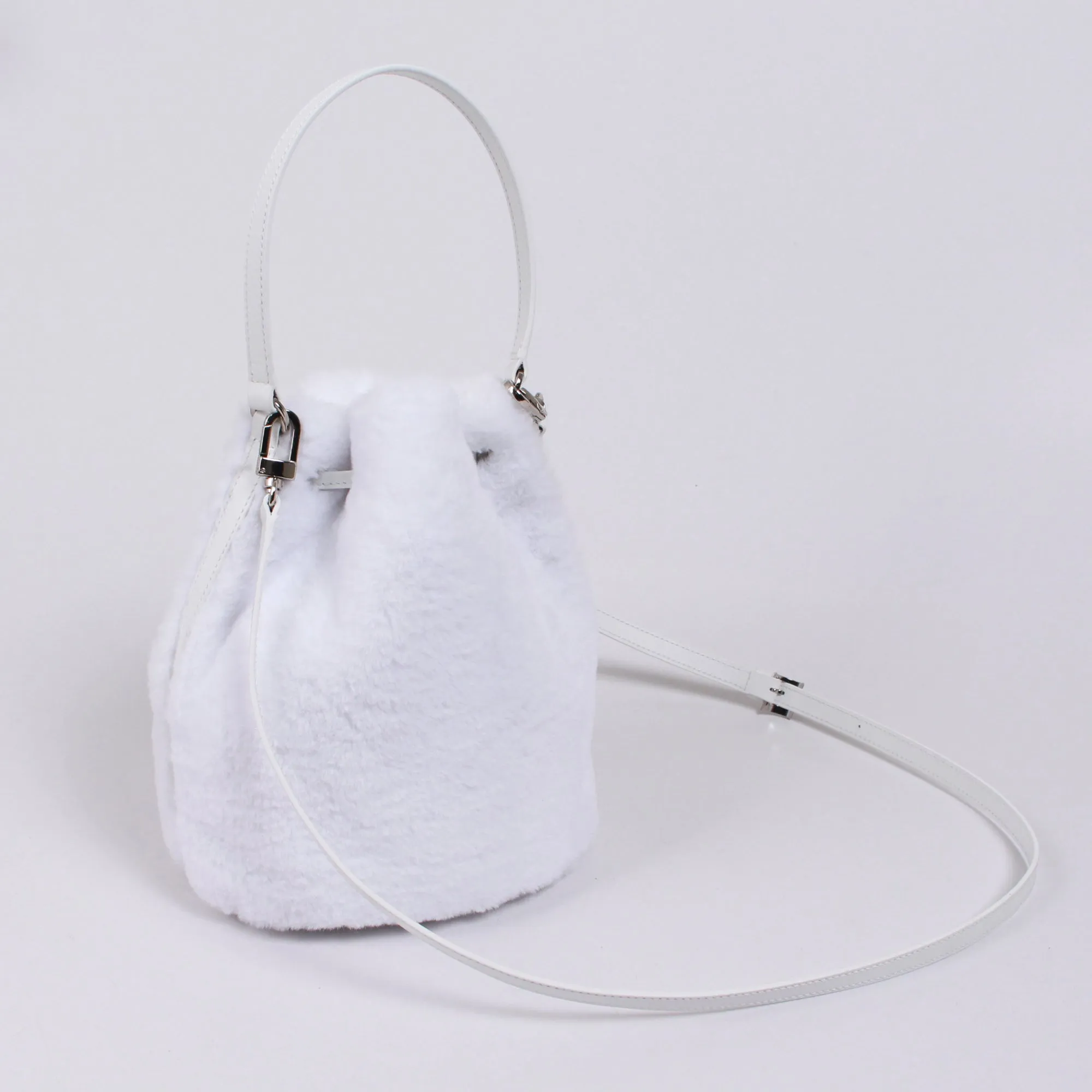 snowball. fur shoulder bag.